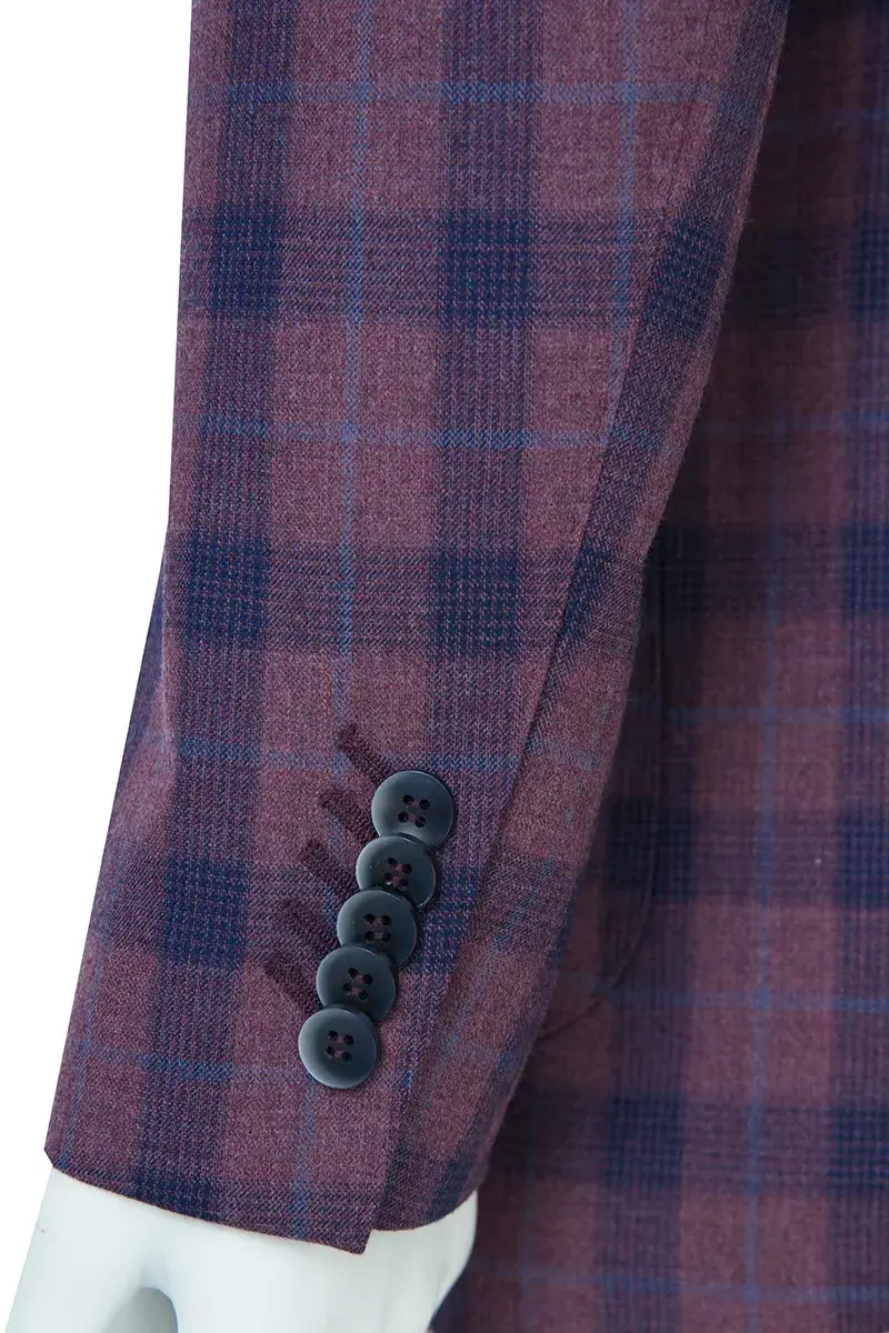 Cinq kissing buttons chevauchants sur une manche de veste