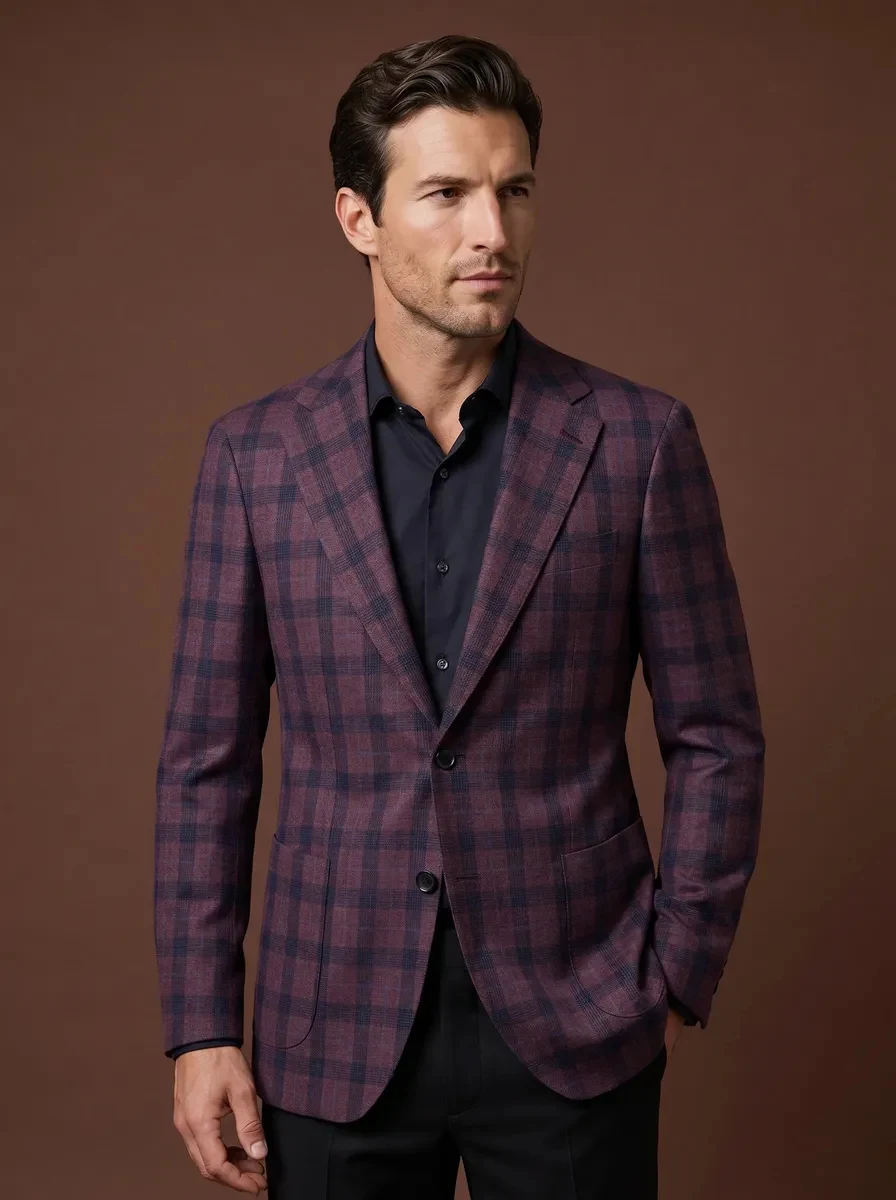 Veste droite à deux boutons portée avec seul le bouton supérieur fermé