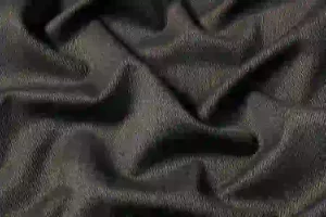 Sergé de laine anthracite Marzotto drapé, montrant le relief diagonal caractéristique du twill
